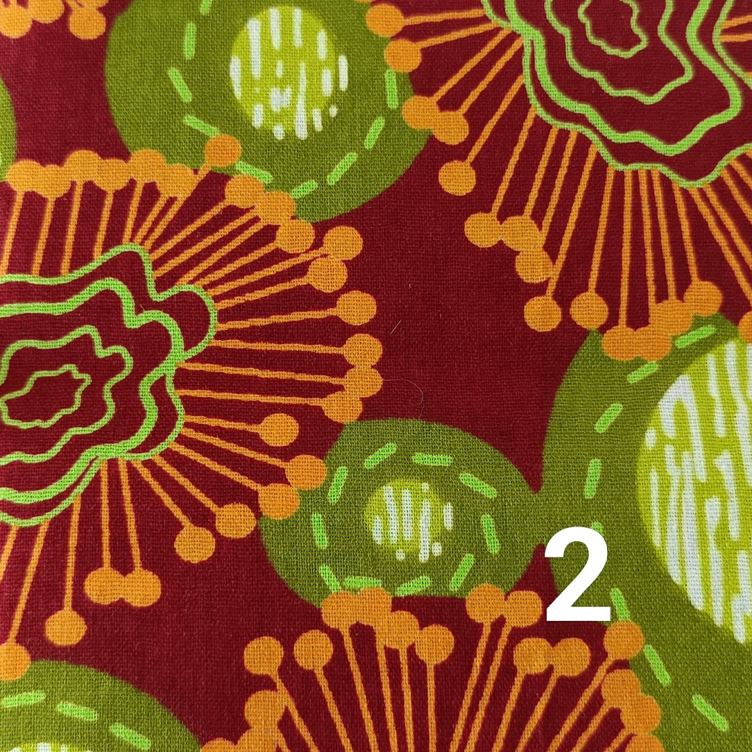 Tissu Wax 2 orange rouge et vert